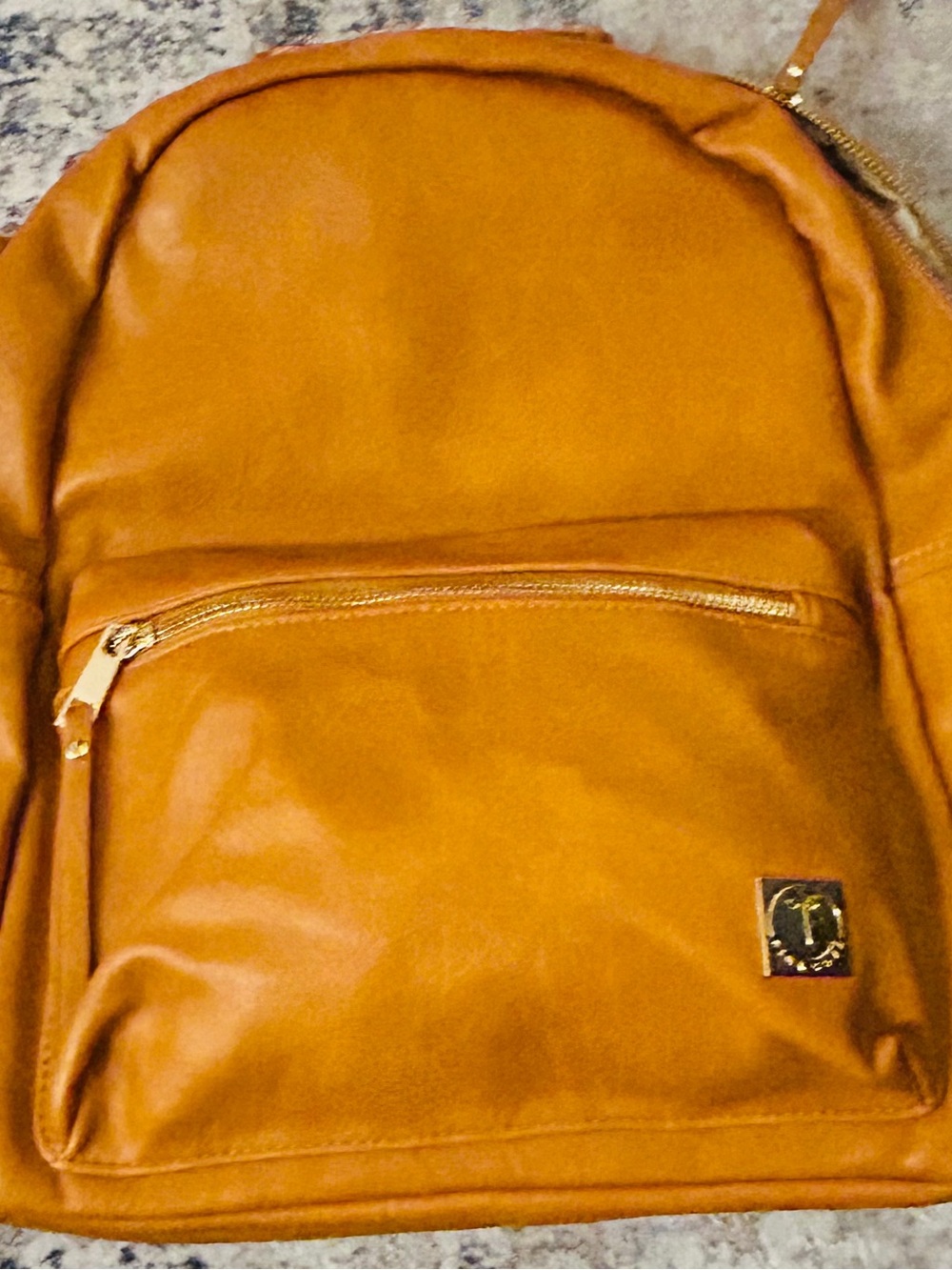 Pink Cove vegan leather backpack. Camel/mustard